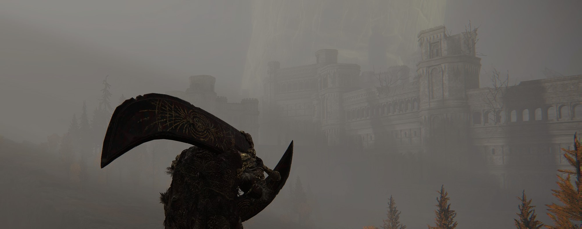 The player peers through pale fog at a distant castle.