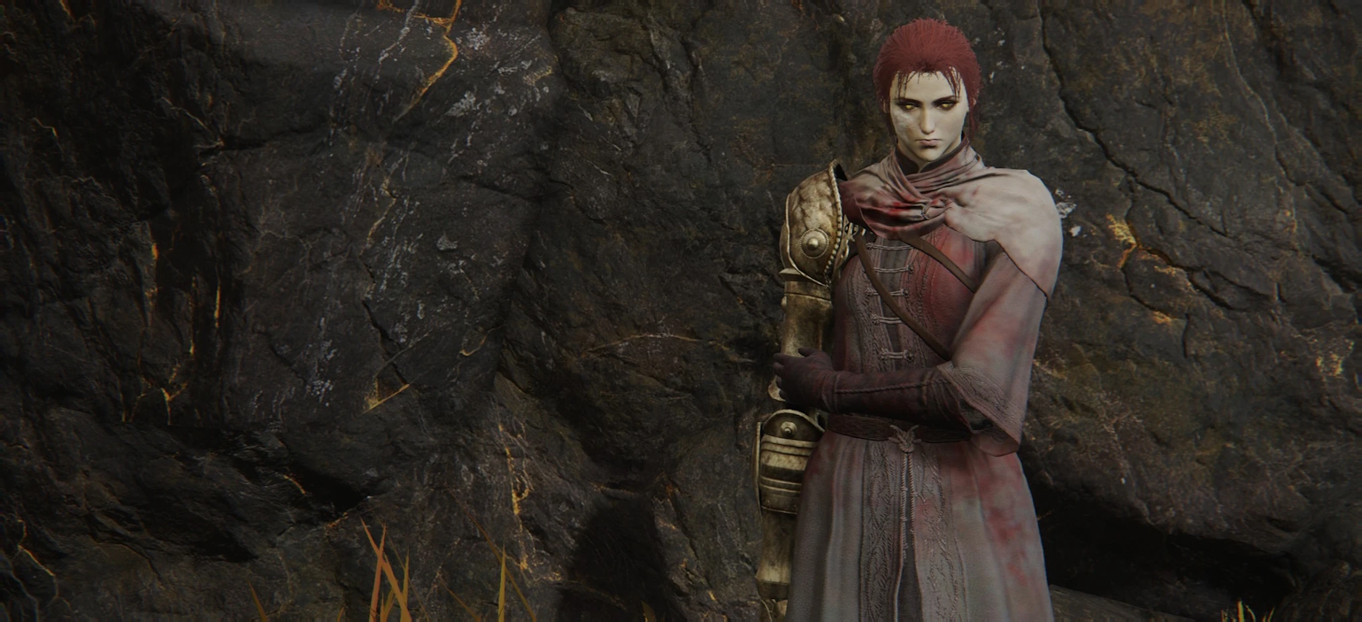 Millicent - a red-headed swordswoman with a golden arm - looks at the camera with determination.