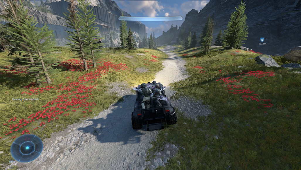 Warthog (truck) among mountain flowers.
